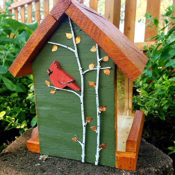 Beautiful handmade wood bird feeder, painted hunter green, or navy and a stained cedar color roof with hand painted accents.
