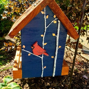 Beautiful handmade wood bird feeder, painted hunter green, or navy and a stained cedar color roof with hand painted accents. Navy