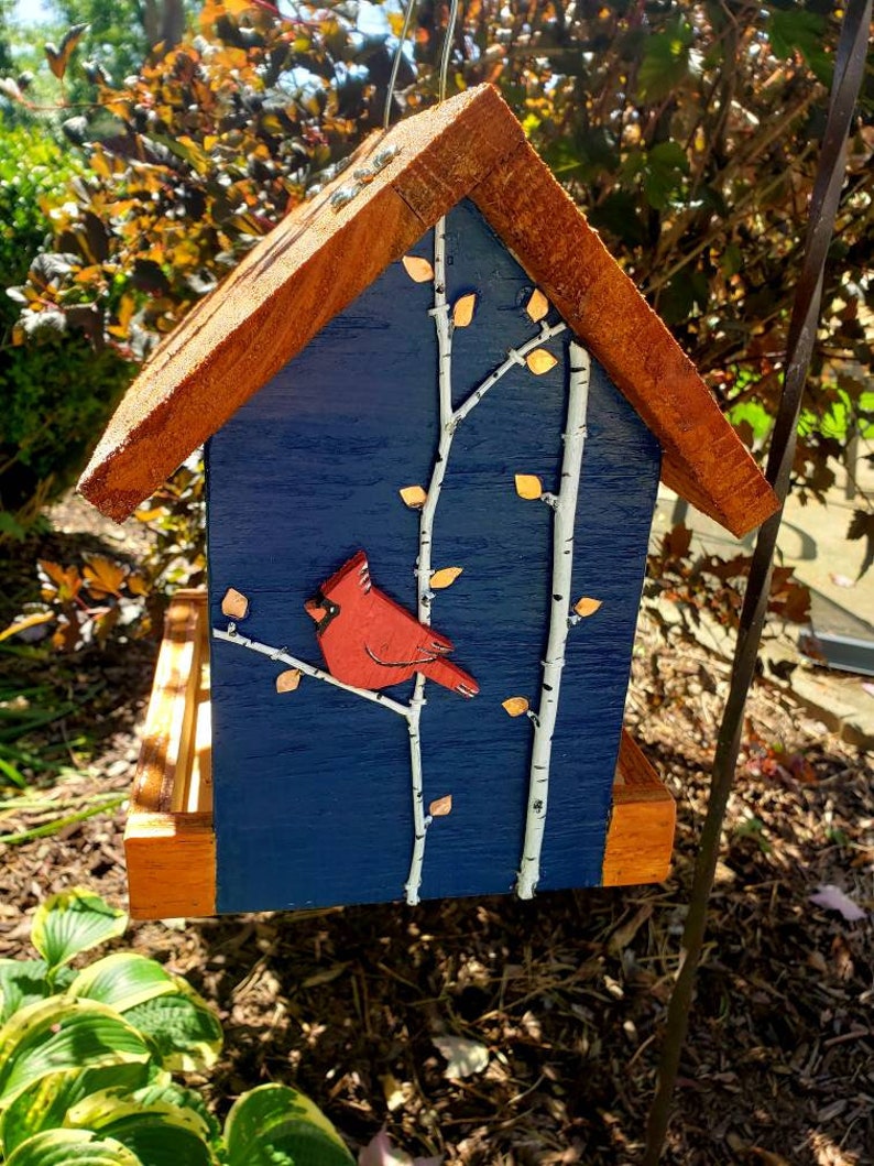 Beautiful handmade wood bird feeder, painted hunter green, or navy and a stained cedar color roof with hand painted accents. Navy