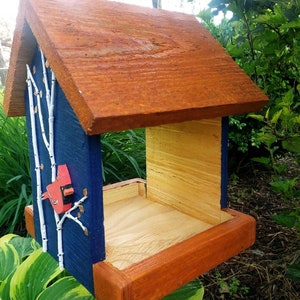 Beautiful handmade wood bird feeder, painted hunter green, or navy and a stained cedar color roof with hand painted accents. image 7