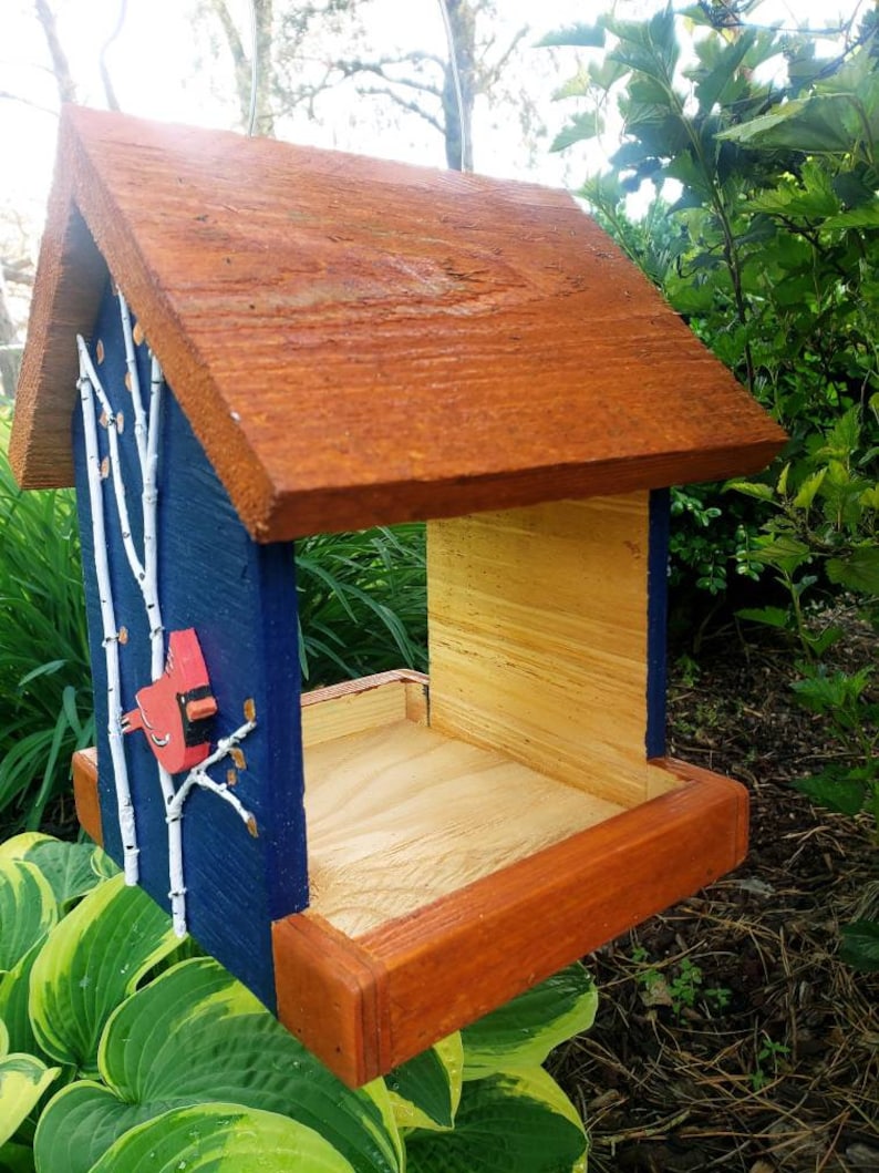 Beautiful handmade wood bird feeder, painted hunter green, or navy and a stained cedar color roof with hand painted accents. image 7