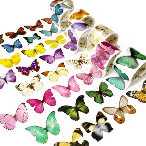 May include: Assortment of colorful washi tapes featuring butterfly designs. Each tape has a different butterfly pattern and color, including pink, blue, green, yellow, and purple.