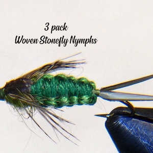 May include: Three pack of green and brown woven stonefly nymphs fishing flies. The flies are tied with a green body and brown wings.