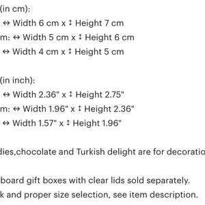May include: A chart showing the size of gift boxes in both inches and centimeters. The chart lists the dimensions for large, medium, and small boxes. The text also states that candies, chocolate, and Turkish delight are for decoration and that cardboard gift boxes with clear lids are sold separately.