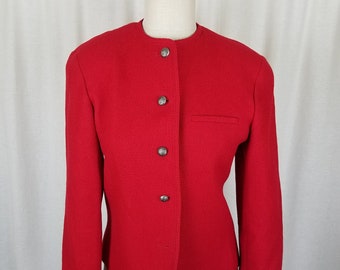 May include: A bright red blazer with a mandarin collar and long sleeves. The jacket features three decorative silver buttons down the front and a small pocket. The blazer is displayed on a mannequin.