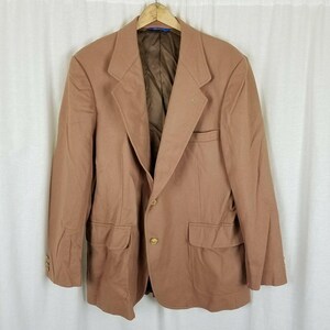 May include: A brown blazer with a single button closure and two flap pockets. The blazer has a brown lining and gold buttons.
