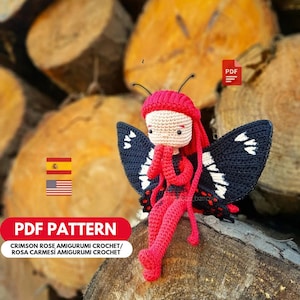 Puede incluir: Muñeca de mariposa amigurumi de ganchillo rosa carmesí hecha a mano con alas negras y blancas. La muñeca tiene sombrero, pelo y piernas rojos. El texto "PDF PATTERN" es visible.