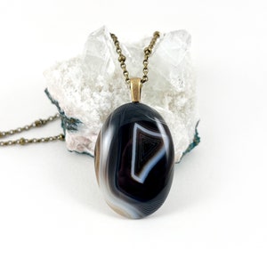 Banded Black Agate Necklace - Black Banded Agate Pendant on Antique Brass Chain - Black & Brown Agate with Feather Bail on Satellite Chain