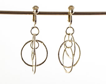 Earrings, clip on drop with hammered dancing hoops in sterling silver