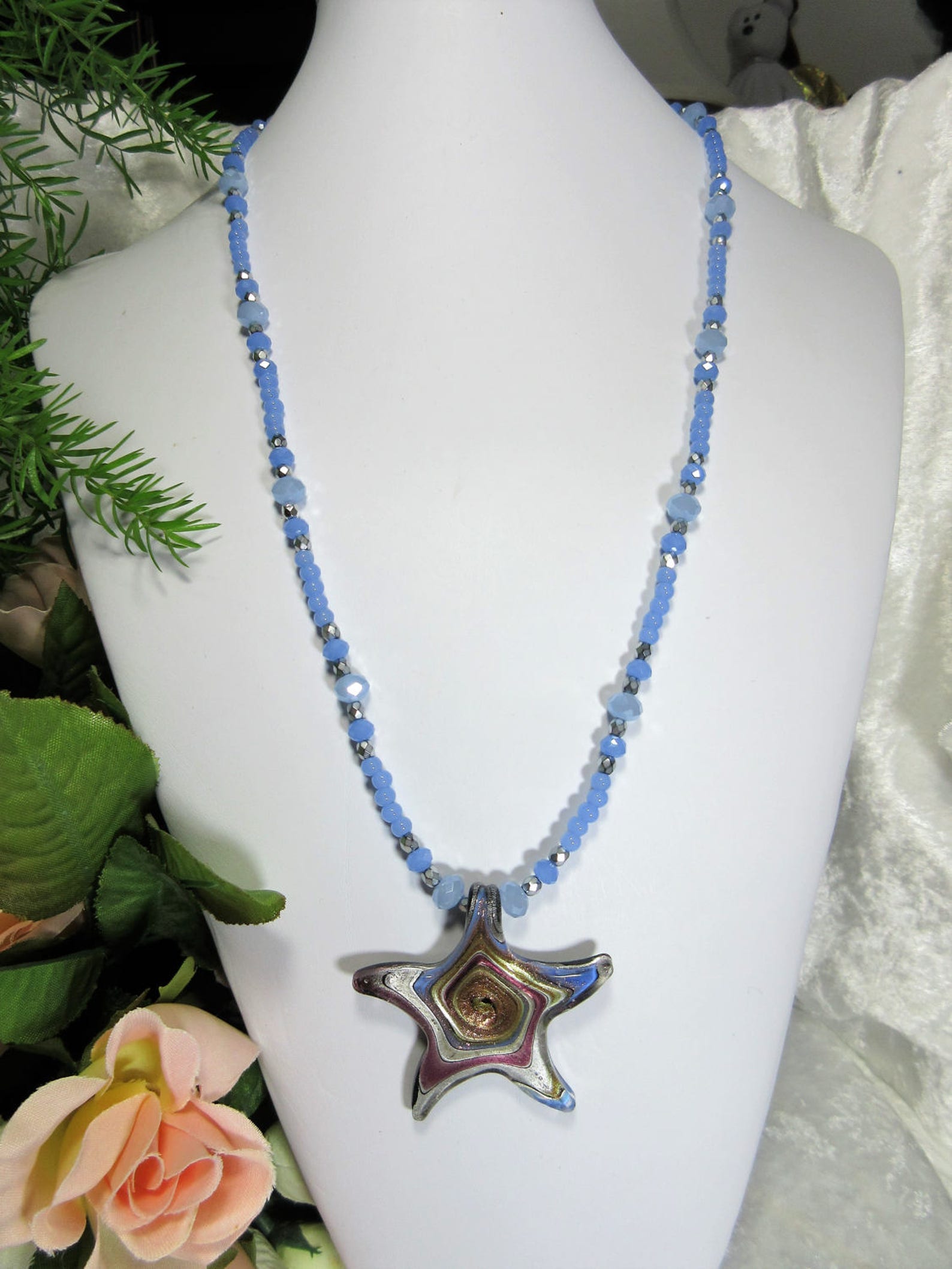Baby blue necklace with silver swirled star pendant blue Etsy