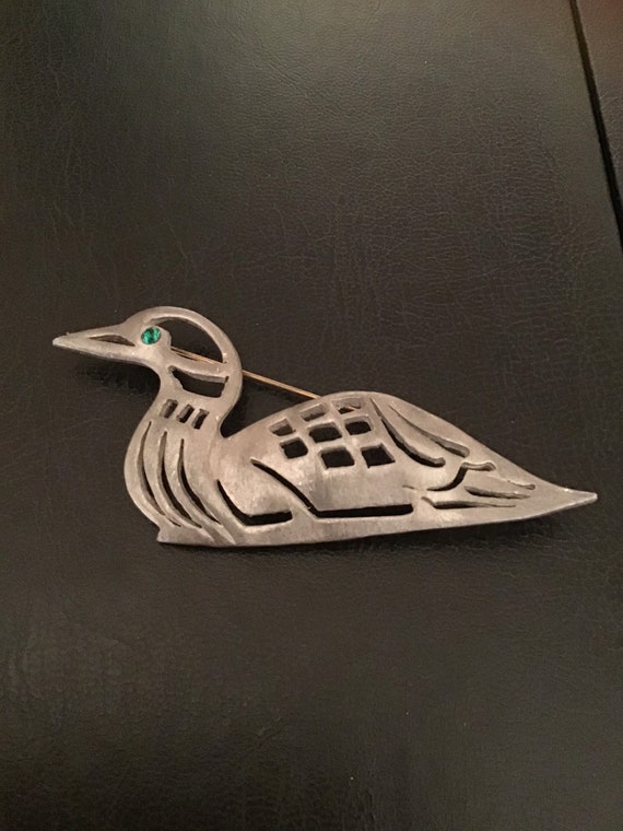 signed Ultra Craft pewter duck with green eye