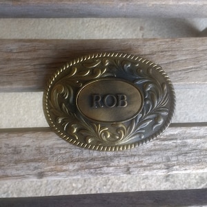 ROB Oval Embossed Metal Belt Buckle Retro Vintage 70s Name Buckle Maker The Kinney Co Year 1977