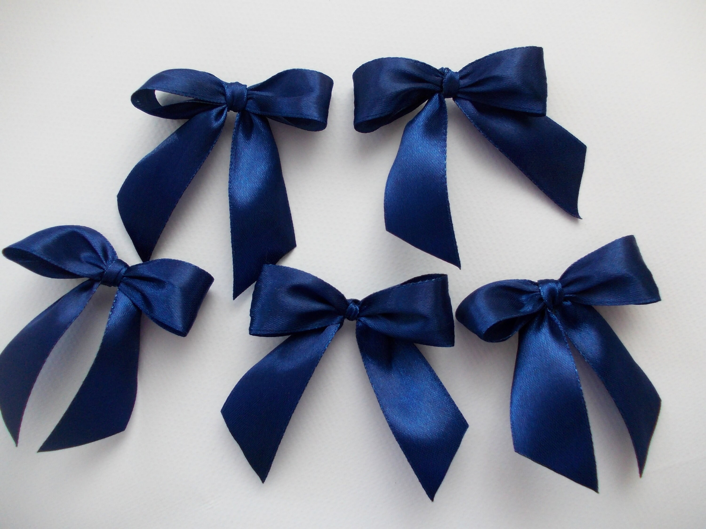 Dark Blue Bow Ribbon Band Satin Navy Stripe Fabric Isolated on