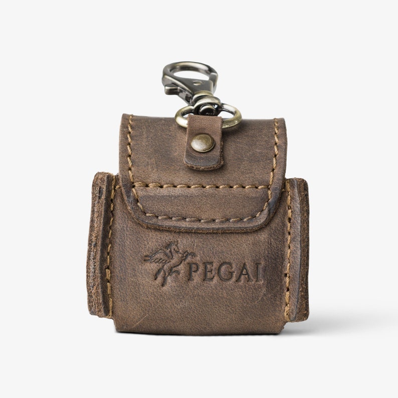 Detailed view of PEGAI-branded AirPods case in Chestnut Brown leather—perfect for meaningful, lasting gifts.