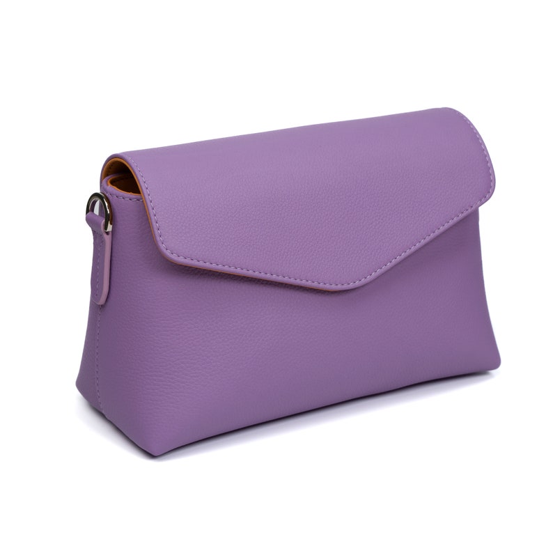 PEGAI Helen Lilac Pebbled Calfskin Leather Handbag featuring a sleek crossbody design, adjustable metal and leather strap, nickel-plated hardware, and a secure magnetic closure. Perfect for a luxurious and stylish look.