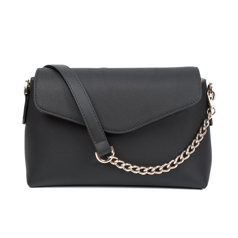 PEGAI Helen Black Pebbled Calfskin Leather Handbag featuring a sleek crossbody design, adjustable metal and leather strap, gold-plated hardware, and a secure magnetic closure. Perfect for a luxurious and stylish look.