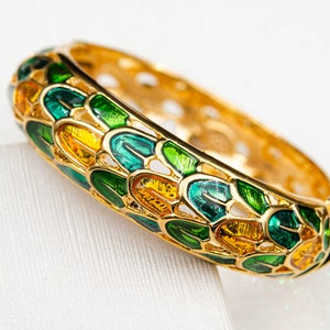 Vintage Joan Rivers bracelet Gold oval hinged bangle Enamel exotic parrot feather bracelet