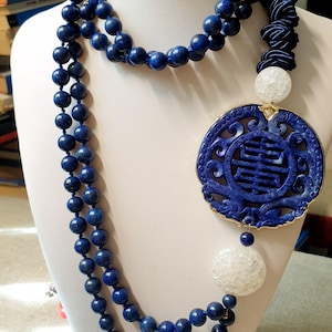 Long necklace with lapis lazuli, jade, crack quartz.