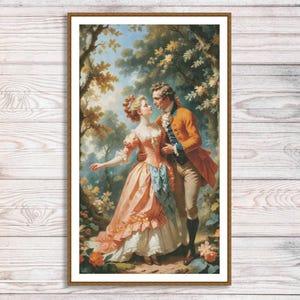 Puede incluir: Una impresión enmarcada de una escena romántica con una pareja vestida con ropa del siglo XVIII. La mujer lleva un vestido color melocotón con una faja azul, y el hombre una chaqueta naranja. La obra de arte está ambientada en un jardín con árboles y flores.