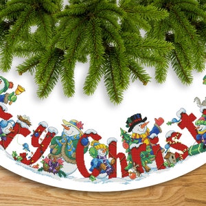 May include: A white Christmas tree skirt with a red "Merry Christmas" border. The border is decorated with snowmen and other winter-themed elements.
