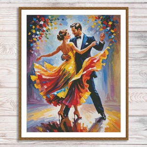 May include: A framed artwork showing a couple dancing. The woman is in a yellow and orange dress, and the man wears a black tuxedo. The background has colourful brushstrokes, and the artwork is framed in a wooden border.
