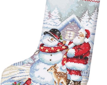 May include: A white stocking with a red and white candy cane border and the word "Angel" embroidered in red. The stocking features a snowman, Santa Claus, a deer, and a rabbit in a winter scene.