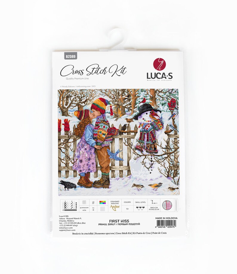May include: A cross-stitch kit titled "First Kiss" featuring a winter scene with a couple kissing and a snowman. The kit includes the Luca-S logo, color and skill level indicators, and the text "Quality Premium Line."