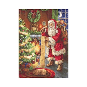 May include: Santa Claus is checking his list in front of a fireplace with a Christmas tree and a dog sleeping on a red rug.