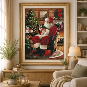 May include: A framed wall art print depicting Santa Claus with a white beard and red suit sitting in a dark leather armchair, reading a book. A decorated Christmas tree, a fireplace with stockings, and a brick wall are visible in the background.