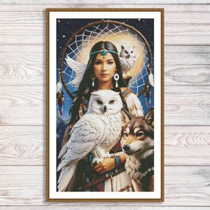 May include: A framed print depicting a woman with long dark hair, wearing a turquoise headband and earrings, holding a white owl. A wolf and a smaller owl are also present. The background features a dreamcatcher and a starry night sky.