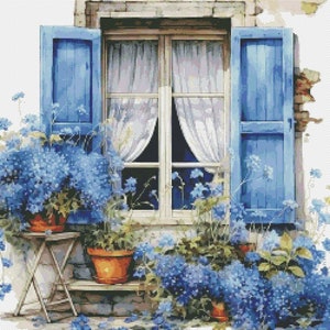 May include: A blue window with white curtains and shutters, surrounded by blue flowers in pots on a wooden ledge.