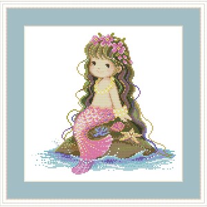 May include: A cross-stitch pattern of a mermaid with long green hair, a pink tail, and a flower crown. She is sitting on a rock with a starfish beside her.