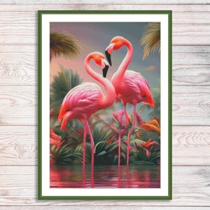 May include: Two pink flamingos stand in a tropical setting with lush green foliage. The flamingos are facing each other with their necks curved in a heart shape.