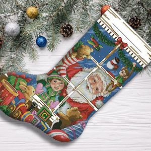 May include: A Christmas stocking with a blue background and a window scene. Santa Claus, a monkey, and a child are looking out the window. The stocking is filled with toys and presents.