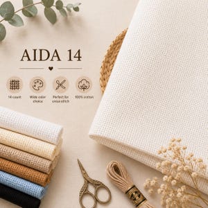 Puede incluir: Tela Aida 14 para punto de cruz en varios colores, incluyendo blanco, beige y azul. La imagen muestra una pila de tela doblada, un gran trozo de tela sin doblar, hilo de bordar y unas tijeras pequeñas. El texto en la imagen dice "AIDA 14".