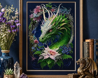 May include: A framed cross-stitch embroidery featuring a detailed green dragon head surrounded by pink and blue flowers against a dark blue background. The dragon has sharp horns and red eyes, framed within an ornate, circular, stone-like border.