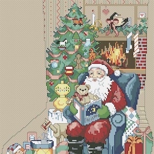 May include: Cross-stitch Christmas stocking featuring Santa Claus reading a book in a blue armchair. A decorated Christmas tree, fireplace, and gifts are in the background. The stocking is beige with a green border.