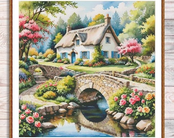 May include: A framed watercolor painting of a quaint cottage with a thatched roof, stone bridges, and a flowing stream. The scene is filled with lush greenery, pink and yellow roses, and flowering trees, creating a serene landscape.