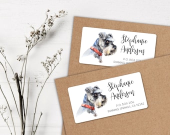 May include: Two white rectangular return address labels with a watercolor illustration of a miniature schnauzer dog wearing a red bandana. The text on the labels reads "Stephanie Anderson" and includes a mailing address.