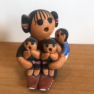 Cochiti Jemez Pueblo Storyteller pottery figure by Native American artist Karen Tenorio