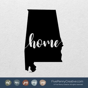 May include: Black silhouette of the state of Alabama with the word "home" written in white cursive inside the state outline.