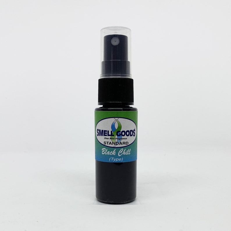 May include: A small black bottle with a black spray nozzle. The bottle has a green and blue label that says "Smell Goods Fine Mist Fragrance Standard Black Chill (Type)"