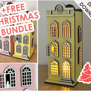May include: A digital download of a Christmas house design. The design features two houses, one pink and one yellow, with windows and doors. The houses are decorated with a Christmas tree and the text "+FREE CHRISTMAS BUNDLE".