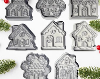 Julpepparkakshus Kakformar och stämplar som separerar