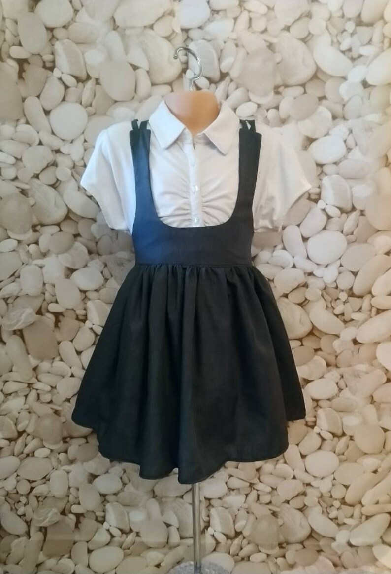 black pinafore dress school