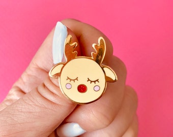 Pin de solapa de esmalte duro con purpurina de macaron de Rodolfo el Reno de la Nariz Roja