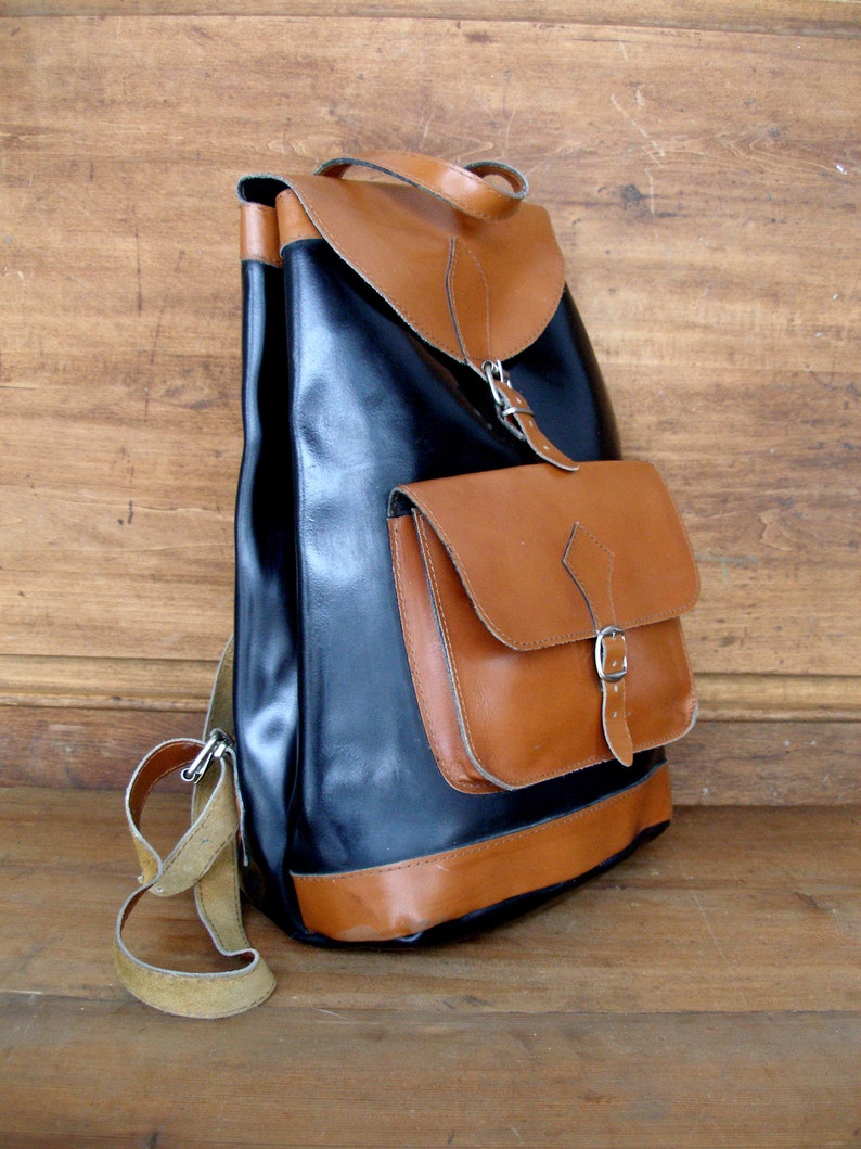 vintage black leather backpack
