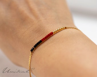 WM Deutschland-Fan-Armband | schwarz/rot/gold mit 585er-Gold vergoldet