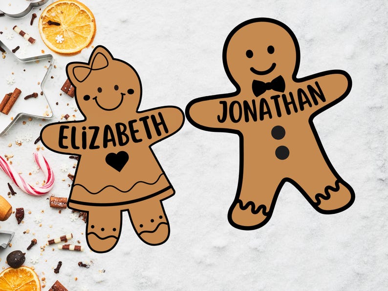Peut inclure: Deux biscuits en forme de bonhomme en pain d'&eacute;pices, l'un avec le nom "Elizabeth" et l'autre avec le nom "Jonathan".