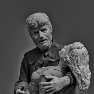May include: A monochromatic gray sculpture depicting a werewolf figure with textured fur on the face and hands, wearing a collared jacket, holding a person with wavy hair who is tilted backward. The figures are rendered in a detailed, realistic style.